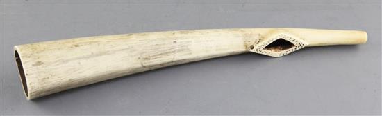 An antique West African ivory oliphant, with dot decorated mouthpiece, 39cm